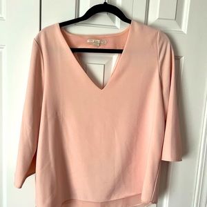 Pink quarter sleeve blouse with cutout back